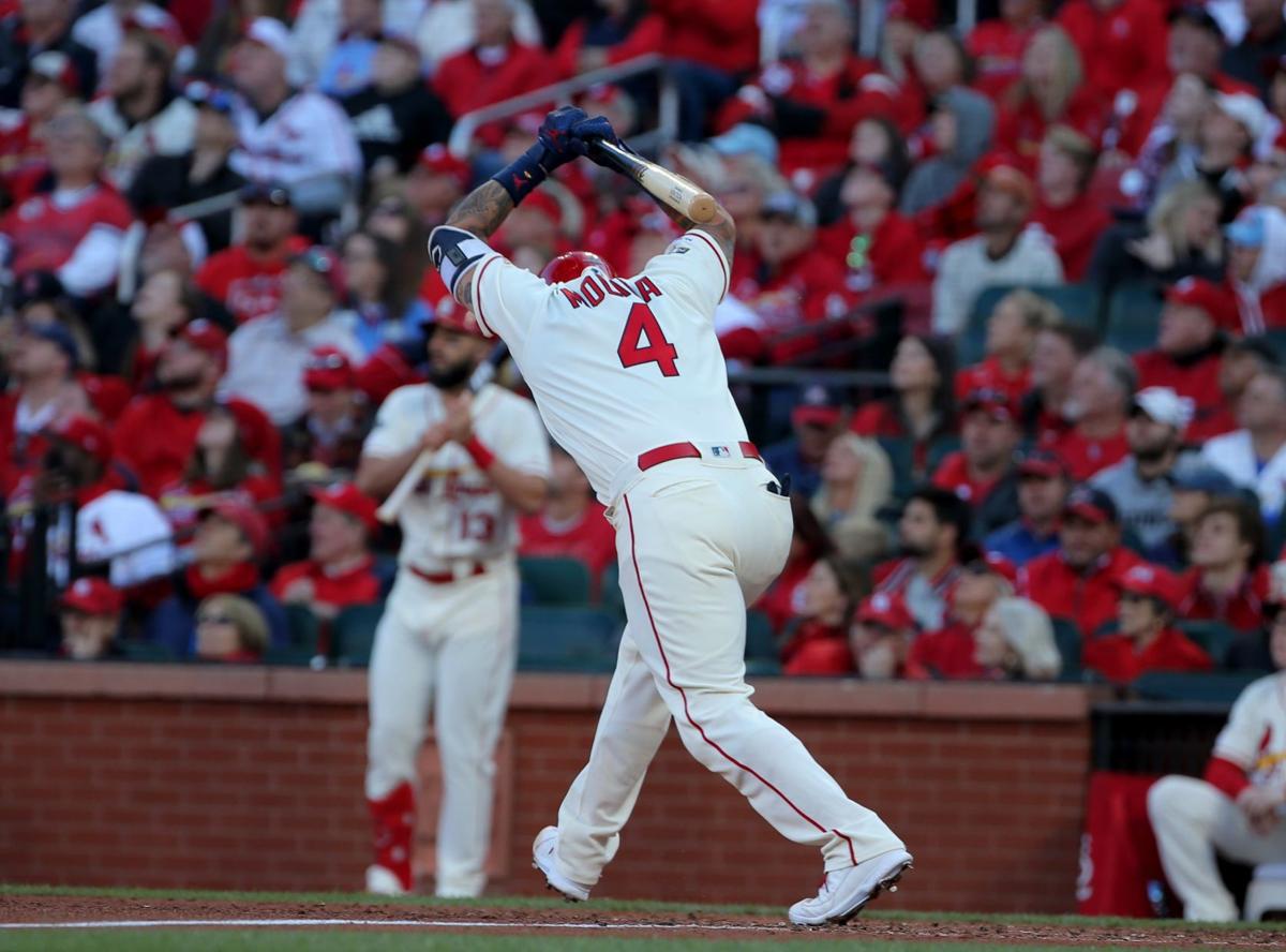 Molina homers, Pujols goes hitless as Cards beat Reds 5-1