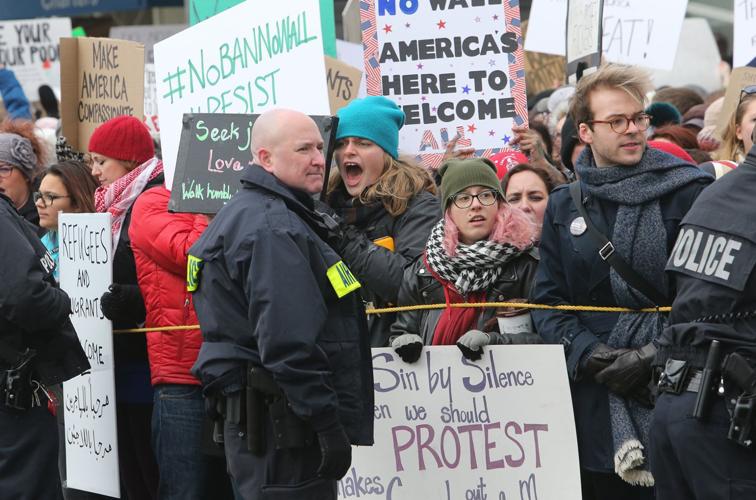 Protesters converge on Lambert over Trump policies
