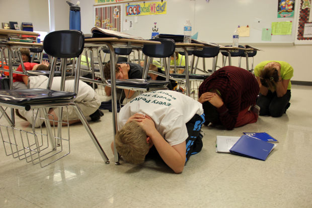 Students participate in ShakeOut earthquake drill