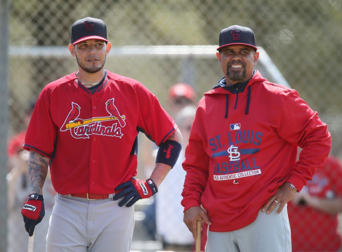 St. Louis Cardinals third base coach Jose Oquendo walks in the