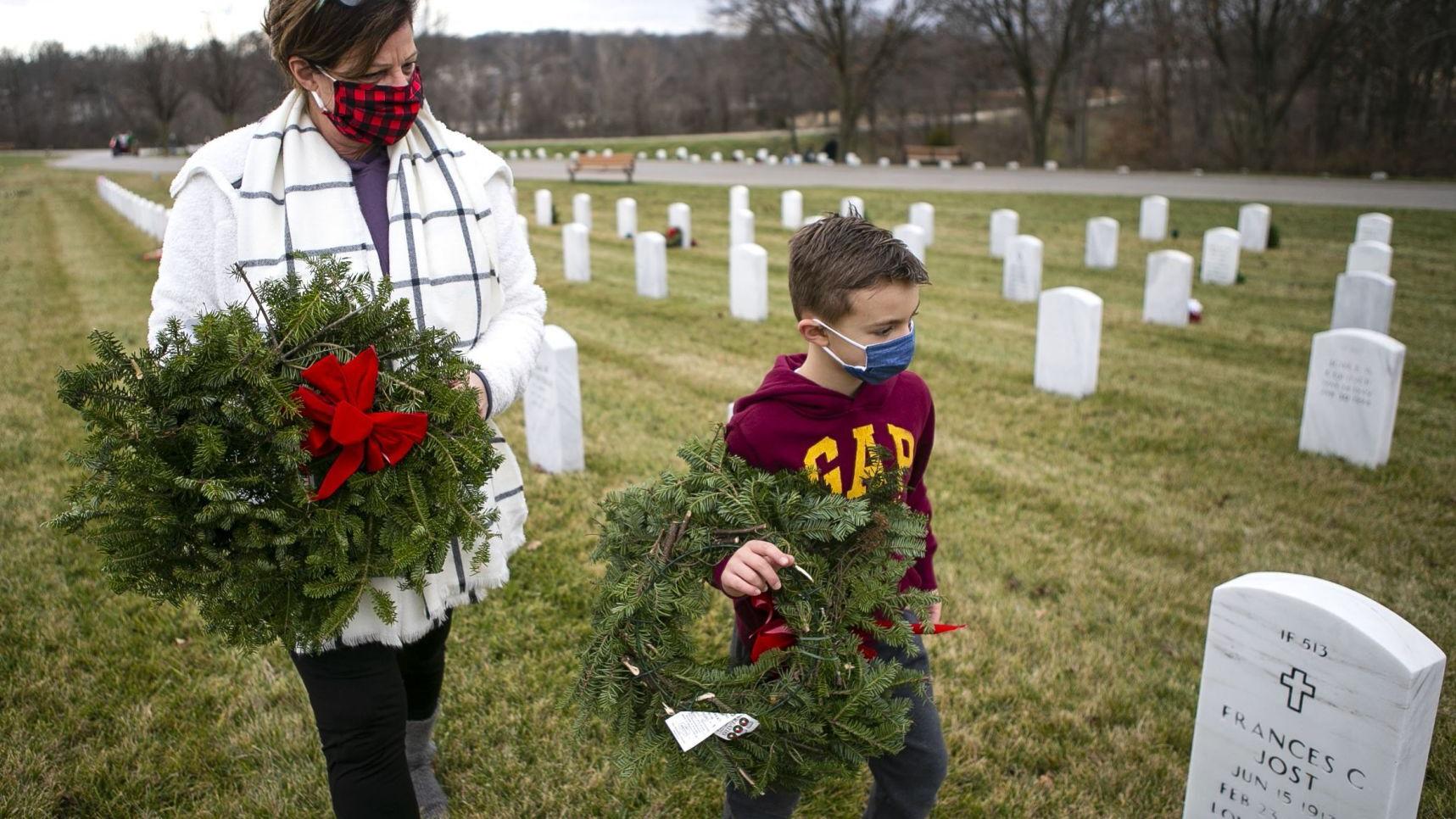 Photos: Wreaths hung on veterans' graves for National Wreaths Across America Day
