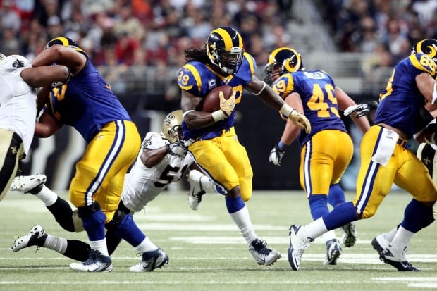 St. Louis Rams Steven Jackson (39) tries to follow a block by