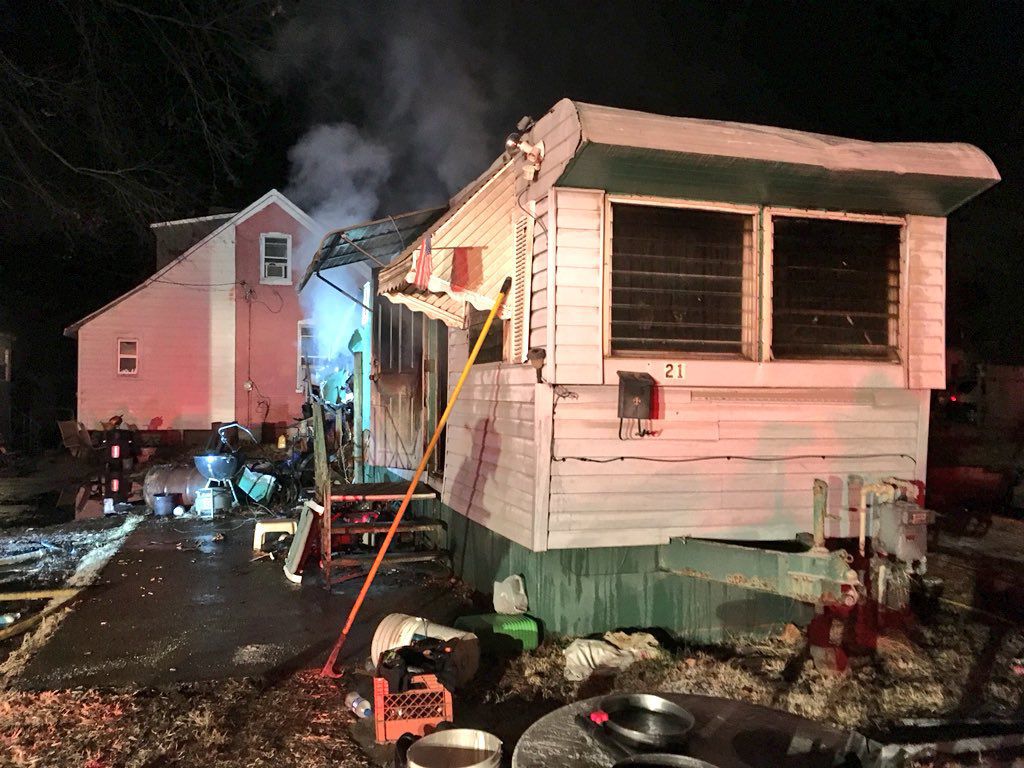Fire that killed 2 men in Belleville trailer home started with space