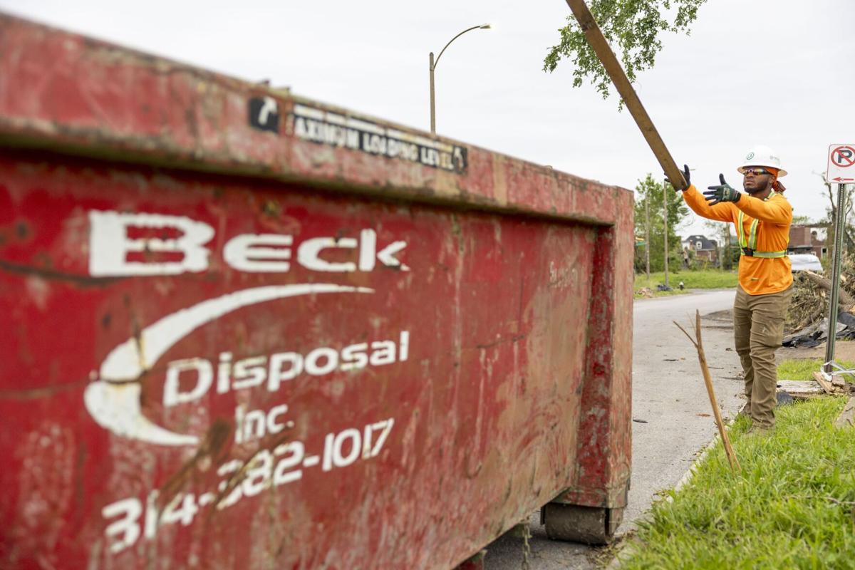 Local volunteer contractors come together to clear tornado damage from sidewalks and roads