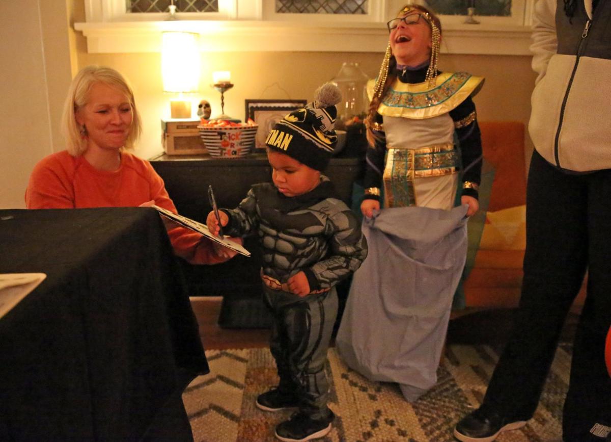 In 50year Halloween tradition, Webster Groves trickortreaters sign In 50year Halloween tradition, Webster Groves trickortreaters sign