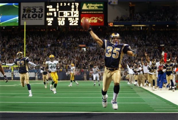 Touchdown, Bruuuuuce! St. Louis Rams legend Isaac Bruce punches ticket to  Hall of Fame