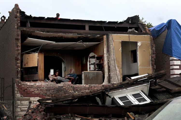 Residents riding out the storm in damaged homes in the Greater Ville neighborhood