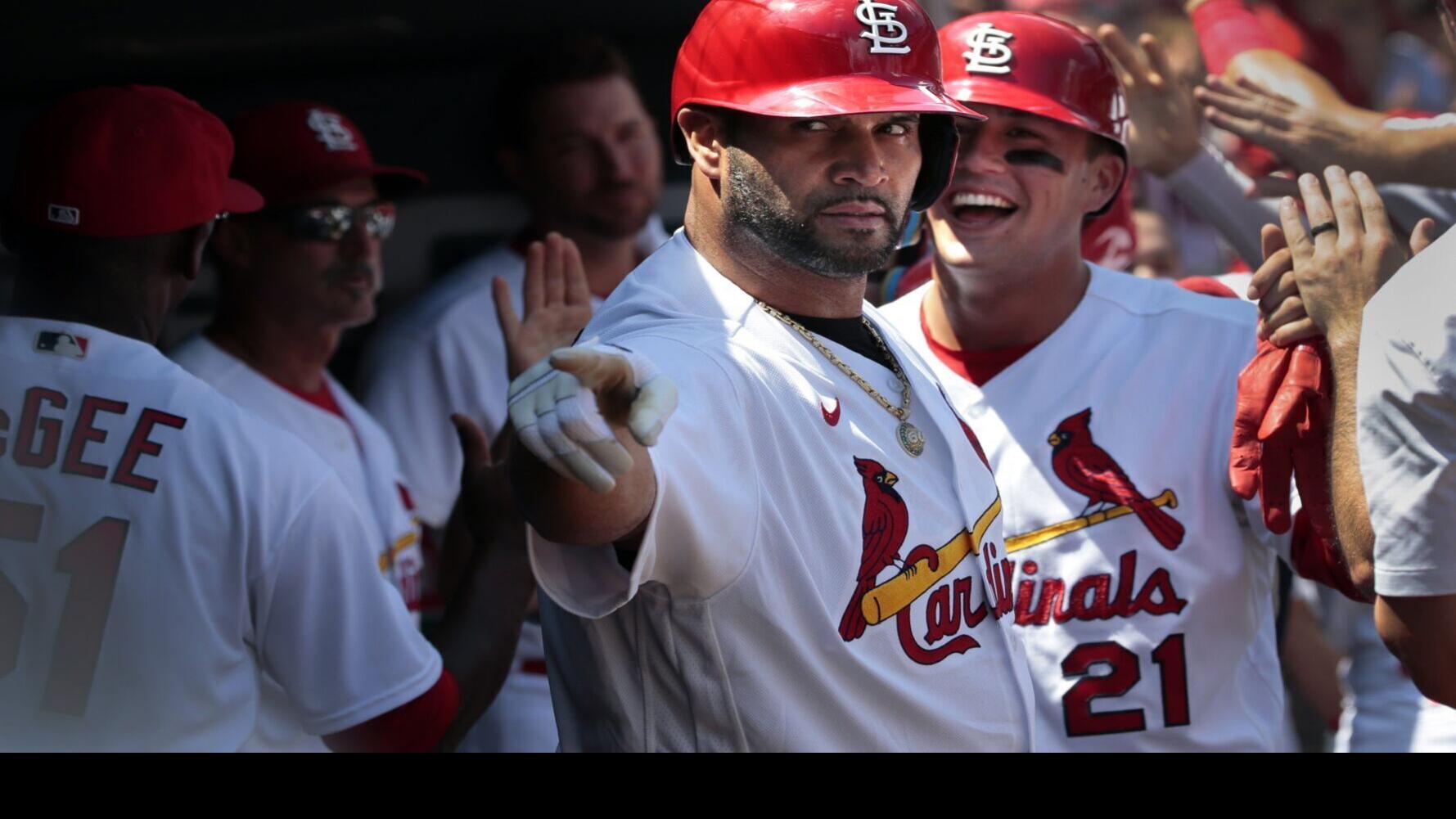 Wainwright masterpiece is overshadowed by Pujols as Cardinals win in a romp