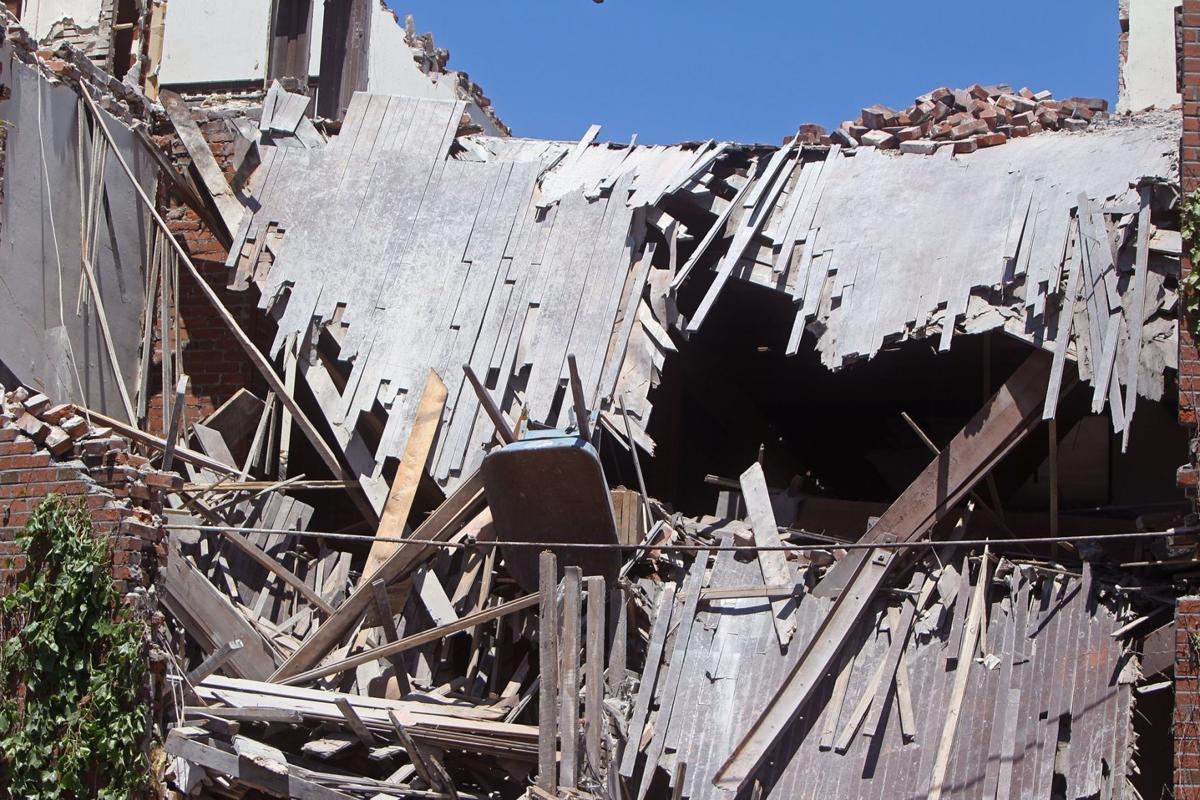 Two demolition workers injured in building collapse in St. Louis Law