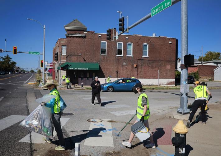 Cyclist advocacy group clears lanes and walkways along Gravois Avenue