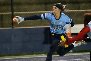 Nov 4, 2025; Tuscaloosa, Alabama, USA; Northside's Chloe Bennett (35) stretches out for a touchdown against Midfield during the first round of the AHSAA flag football playoffs at Northside High School.