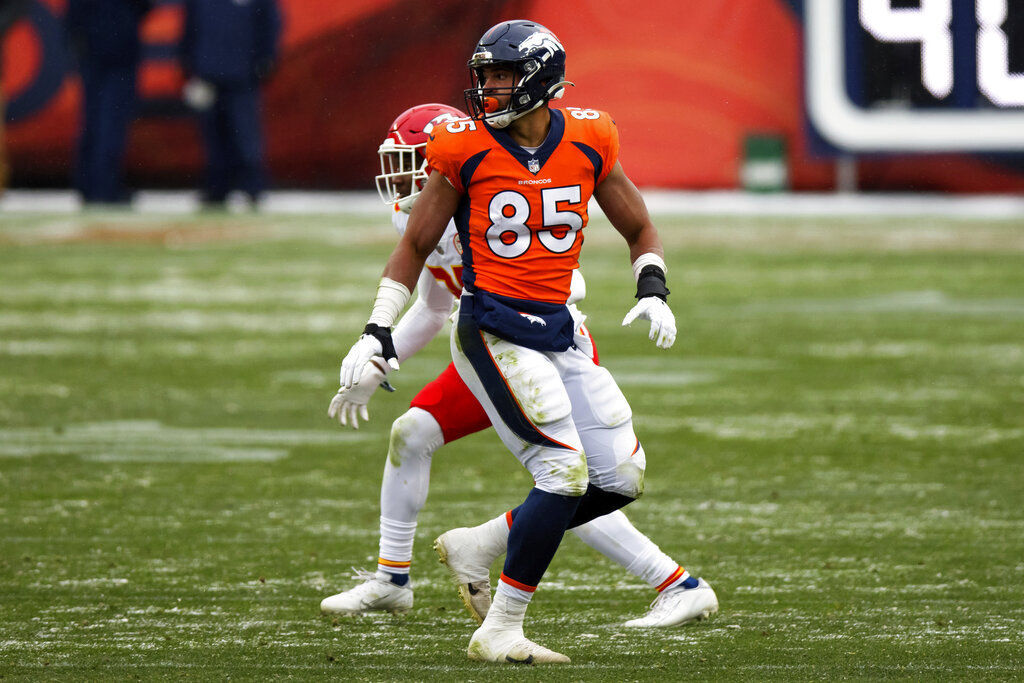 Denver Broncos tight end Albert Okwuegbunam runs against the Los Angeles  Rams during the first half of an NFL preseason football game Saturday, Aug.  26, 2023, in Denver. (AP Photo/Jack Dempsey Stock