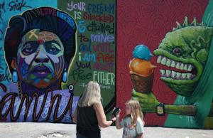 Paint St. Louis puts new art on an old downtown St. Louis wall