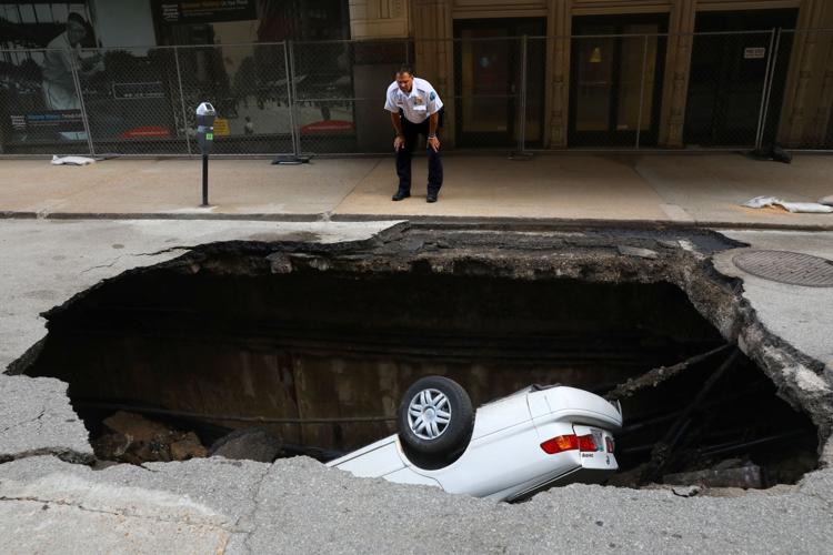 Sinkhole opens up on 6th street downtown
