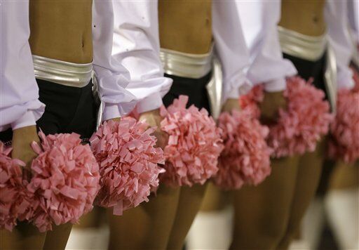 NFL cheerleaders go pink for breast cancer