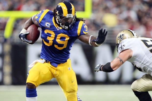 St. Louis Rams Marshall Faulk (L) congratulates Isaac Bruce after Bruce  scored a touchdown against the Seattle Seahawks in the first quarter at the  Edward Jones Dome in St. Louis on December