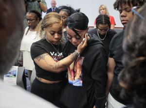 Ferguson police arrest three in bystander mother’s shooting death