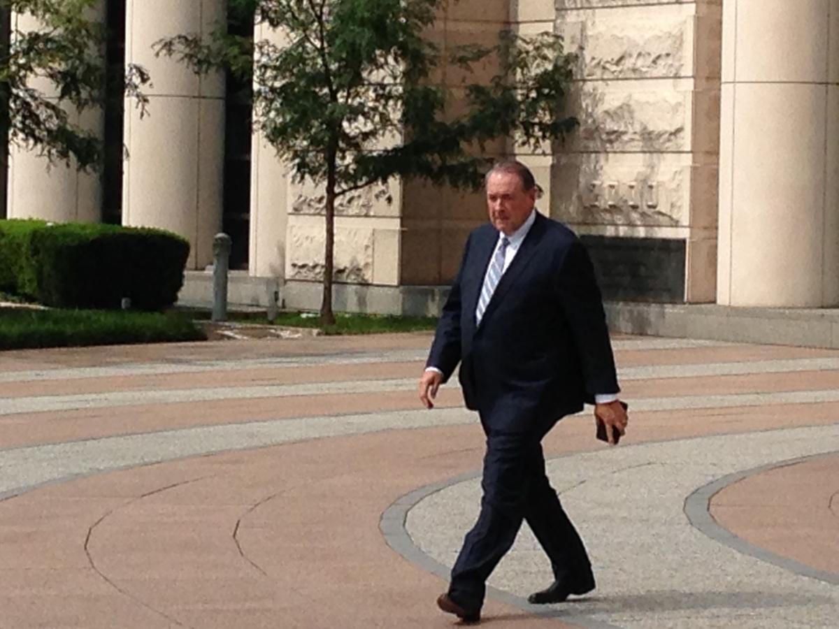 Former Arkansas Gov. Mike Huckabee leaves federal court in St. Louis