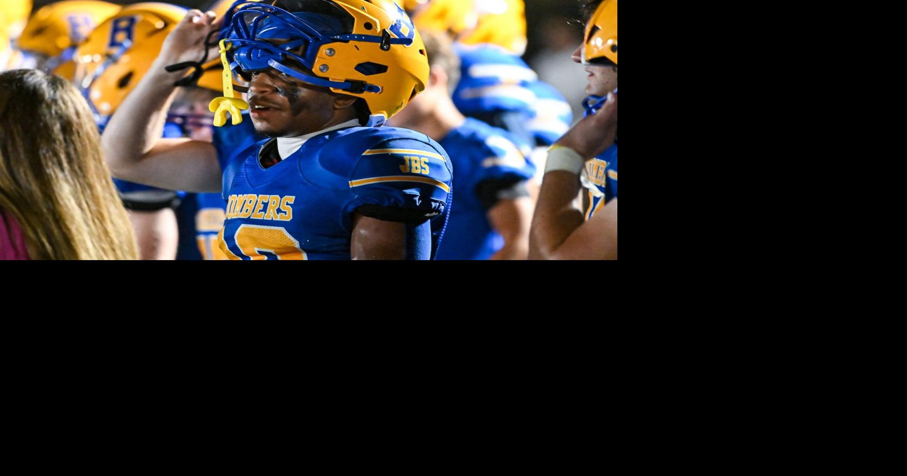 Dylan Macon shines under the lights as John Burroughs runs past ...