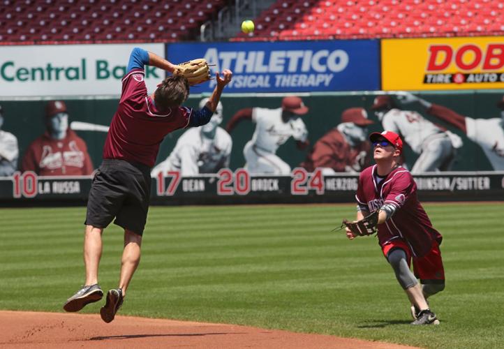 Illinois, Missouri legislatures playing softball game at Busch Stadium