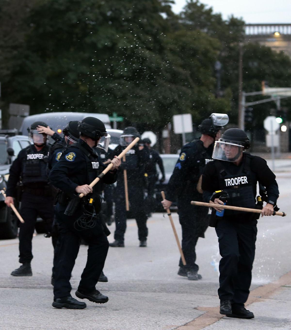 Protesters spend day at police headquarters