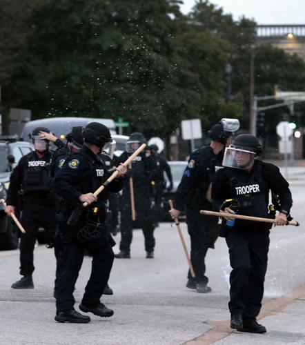 Protesters spend day at police headquarters