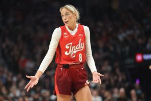 Jul 31, 2026; Portland, Oregon, USA;  Indiana Fever guard Sophie Cunningham (8) reacts to game play against the Portland Fire during the first half at Moda Center. Mandatory Credit: Jaime Valdez-Imagn Images