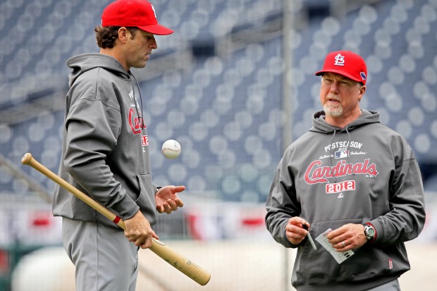 Mark McGwire begins life as the St. Louis Cardinals' hitting coach