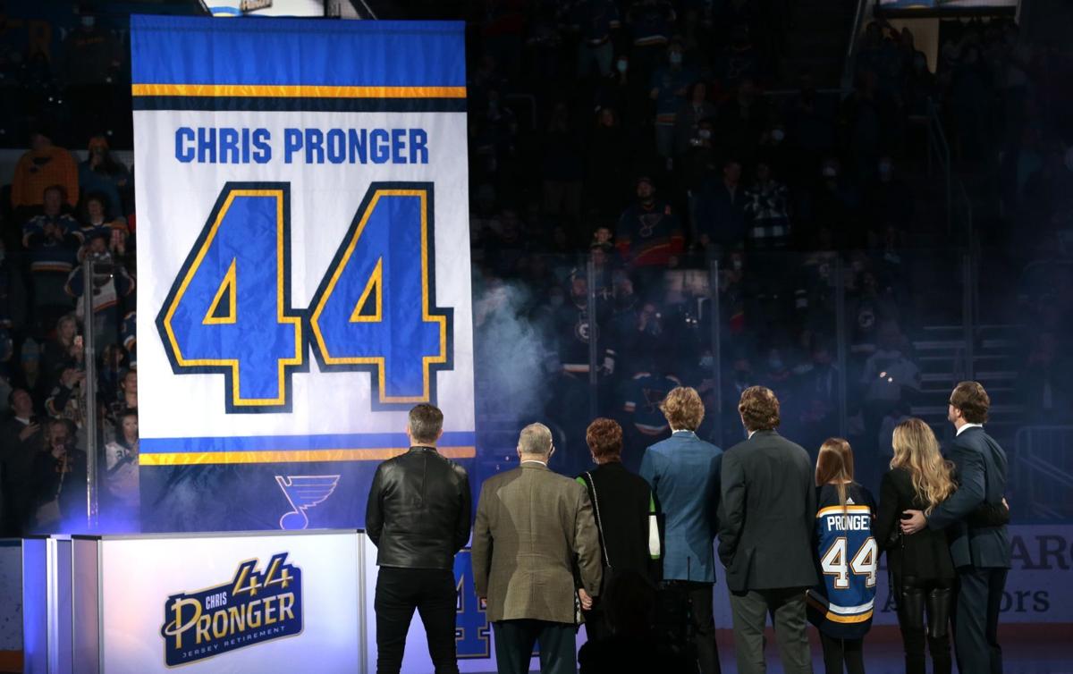 Chris Pronger chugs a beer as his No.44 is retired by Blues