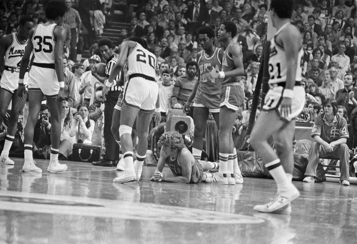 Former NBA great Bill Walton cheers on Arizona during the second half of  their NCAA West Regional final game against Kansas Saturday, March 29,  2003, in Anaheim, Calif. Walton's son is Arizona