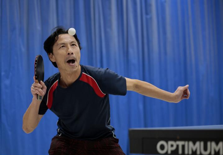Table tennis enthusiasts meet and play hard