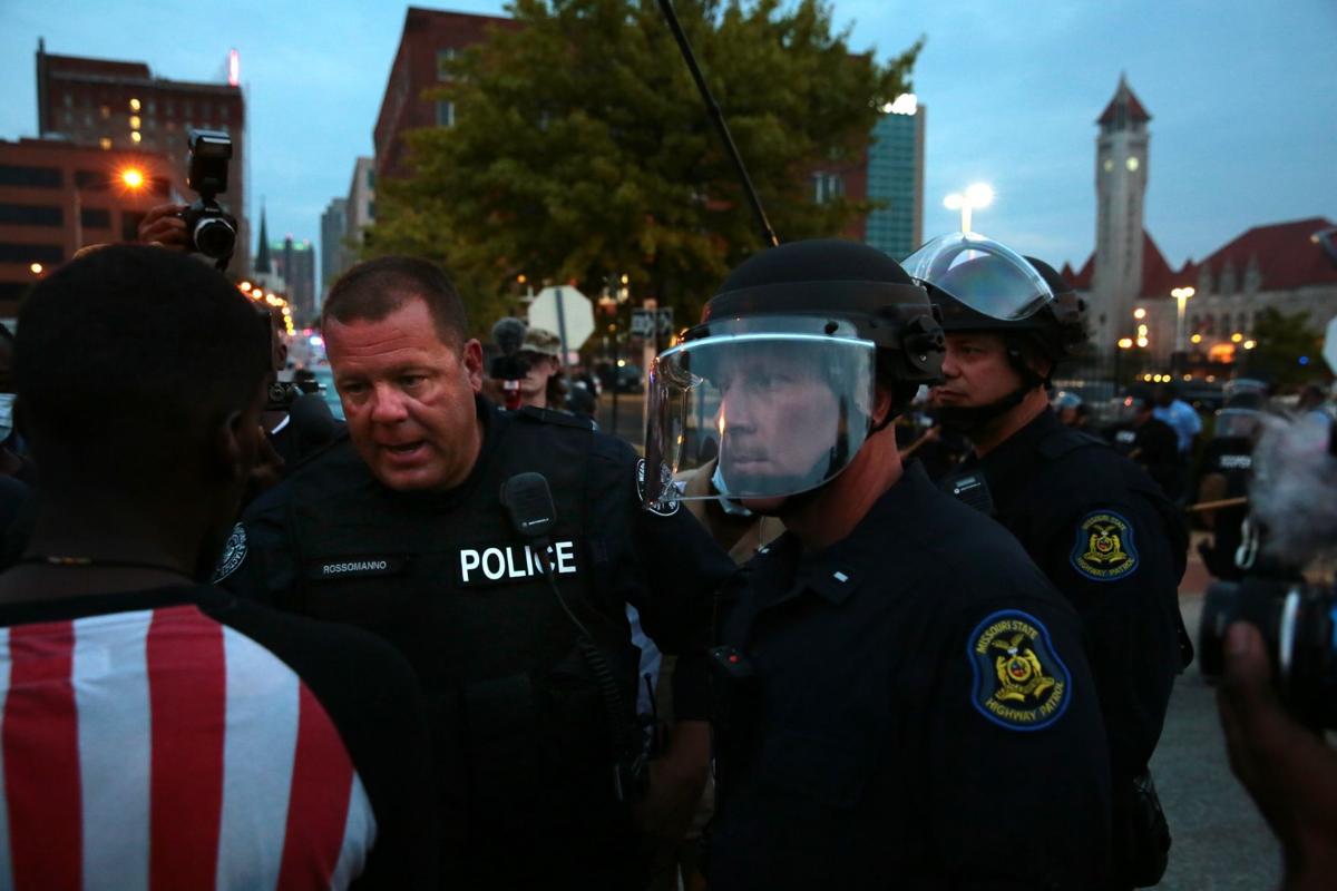 Protesters spend day at police headquarters