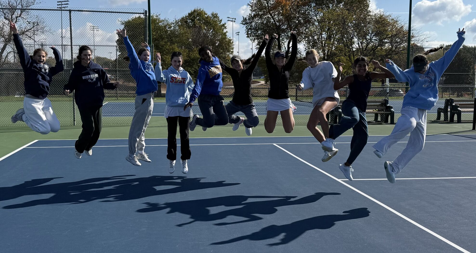 John Burroughs girls team tennis celebrates