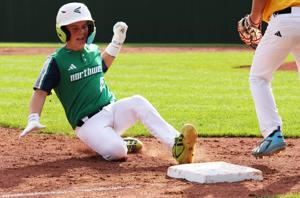 Kasen Workman of Tacoma, WA (Northwest Region) hits a triple in the seventh inning scoring two runs against Phenix, AL