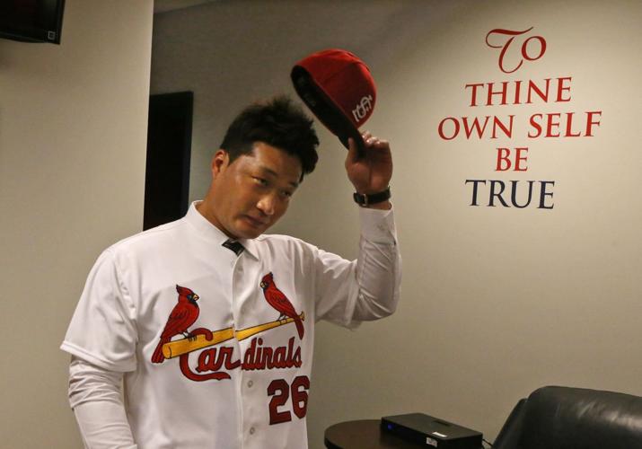 Cards introduce new Korean relief pitcher