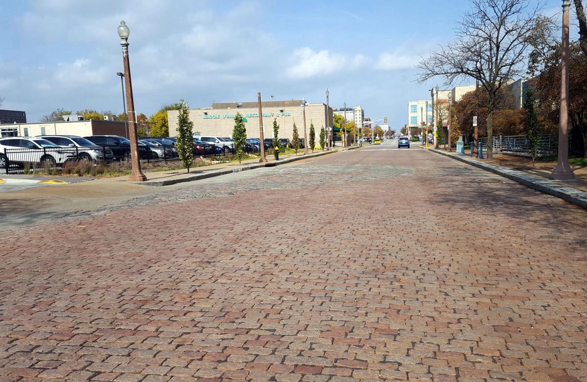Spotlight Cobblestone, brick streets cling tight to hang on in St