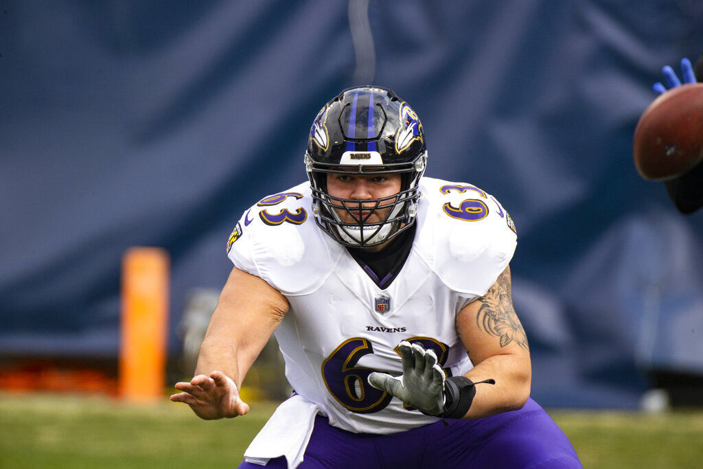 Baltimore Ravens center Trystan Colon (63) warms up prior to an NFL  football game between the Ravens and the New England Patriots, Sunday,  Sept. 25, 2022, in Foxborough, Mass. (AP Photo/Paul Connors