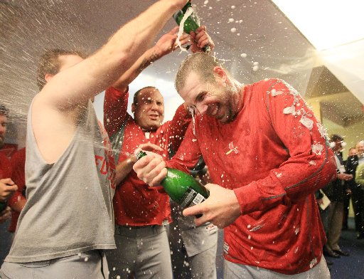 Chris Carpenter wishes he could have helped Roy Halladay