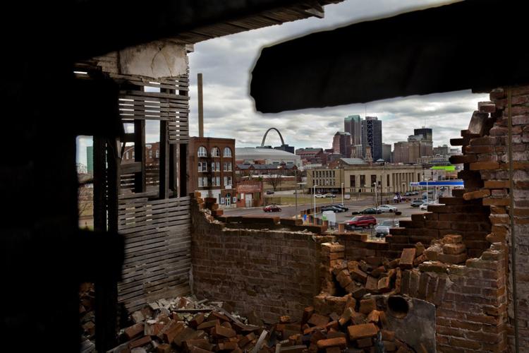 The second floor crumbles on this 14th Street property