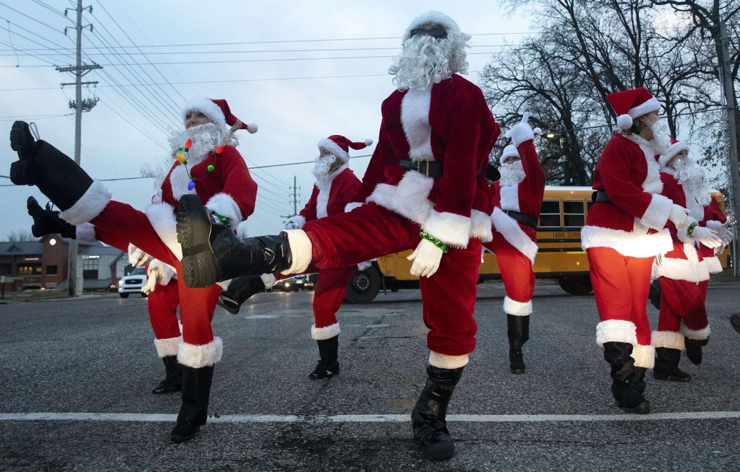 Photos: Dancing Santas raise money for charity spread holiday cheer
