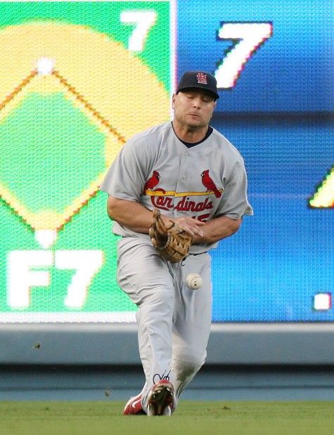 Matt Holliday with his son at Dodger Stadium during the NLCS