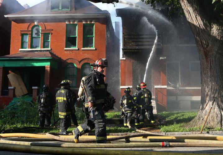 Fire in home spreads to two others