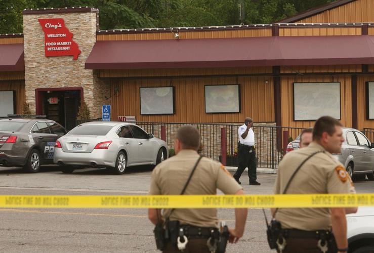 Police officer fatally shot in Wellston, suspect in custody