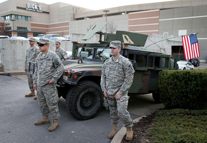 Protesters march around West County Center mall and on Manchester Road