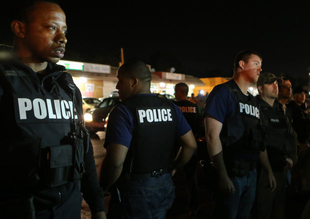 Police face off with protesters