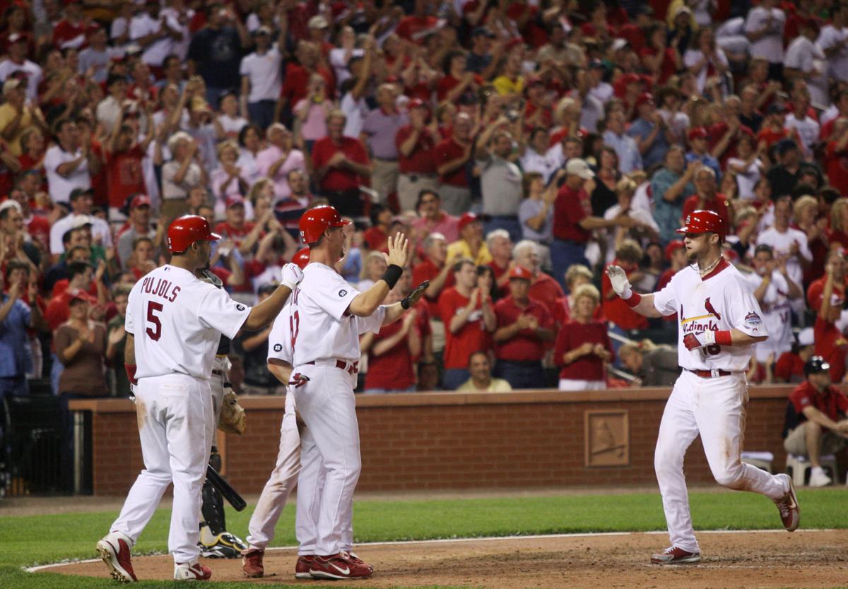 St. Louis Cardinals Albert Pujols swings as he hits a solo home run in the  seventh inning against the Milwaukee Brewers at Busch Stadium in St. Louis  on July 1, 2010. UPI/Bill