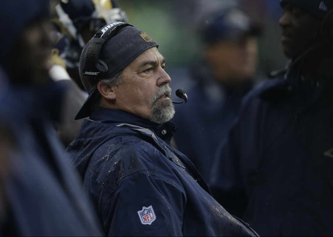 St. Louis Rams head football coach Jeff Fisher watches the action against  the Oakland Raiders in the first quarter at the Edward Jones Dome in St.  Louis on November 30, 2014. St.