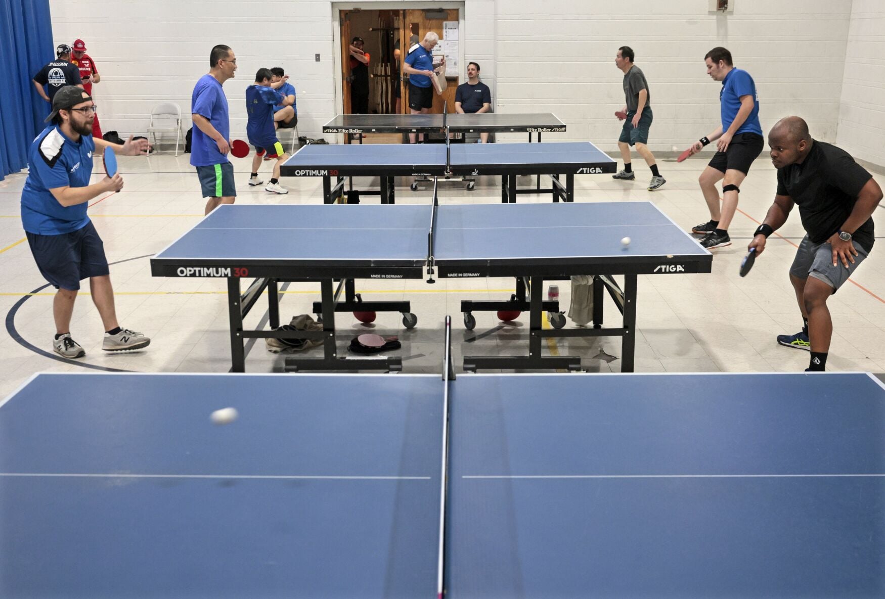 Table tennis enthusiasts meet and play hard