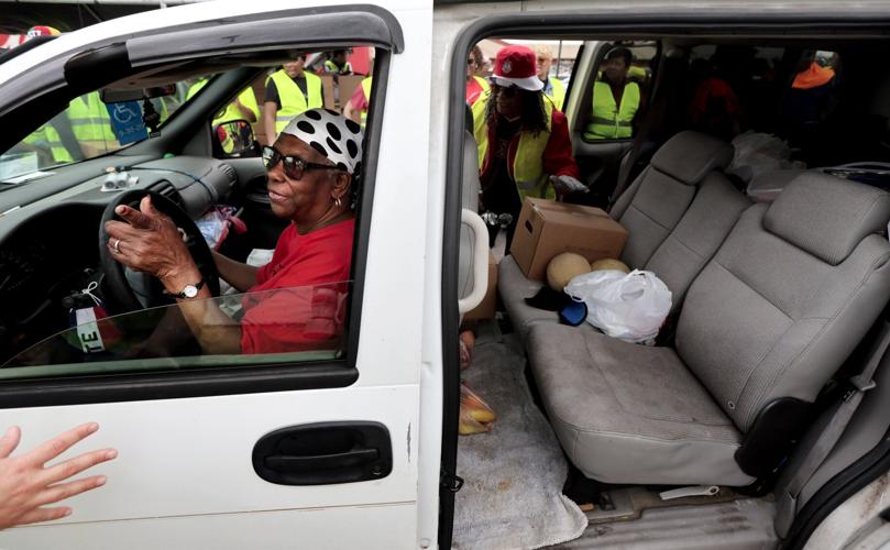 Cars wrap around the block twice over for Urban League large-scale distribution event