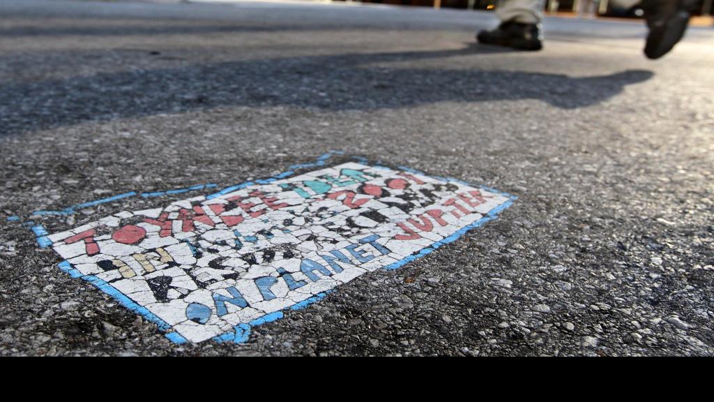 Mysterious 'Toynbee Tiles' becoming targets of theft in St. Louis ...